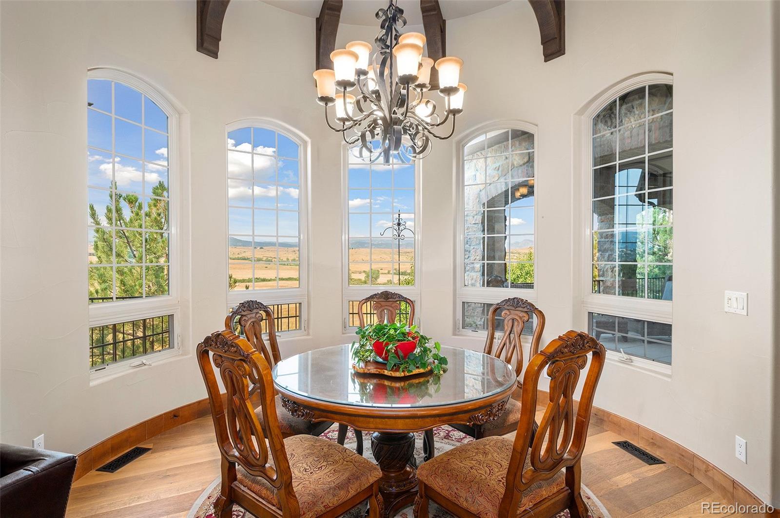 5740 Lambert Ranch Trail Sedalia, CO 80135 - Photo 11 of 48 a view of a dining room with furniture window and outside view