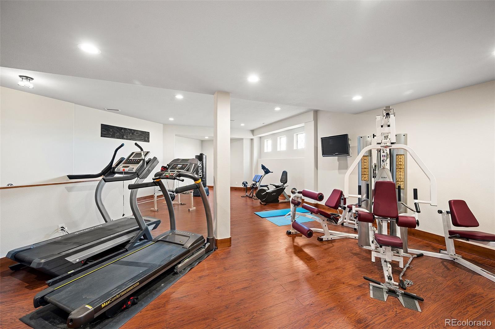 5740 Lambert Ranch Trail Sedalia, CO 80135 - Photo 29 of 48 a view of a room with gym equipment