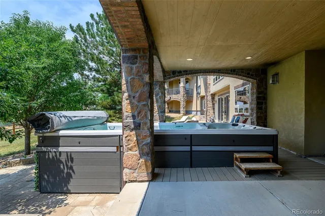 an aerial view of a house with outdoor space