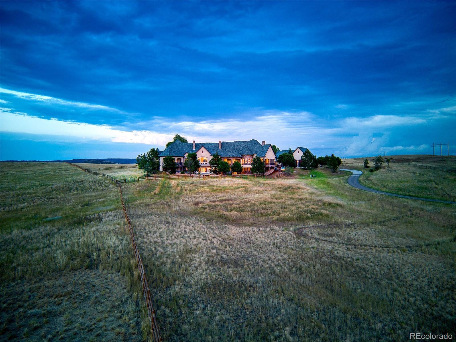 5740 Lambert Ranch Trail Sedalia, CO 80135 - Photo 39 of 48 a view of a field with an trees