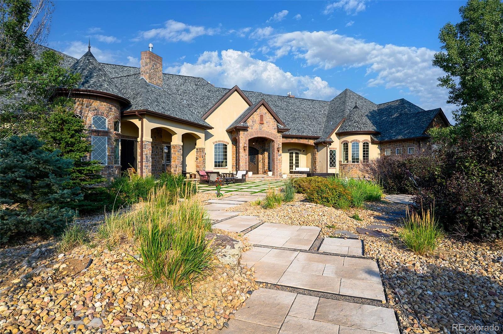 5740 Lambert Ranch Trail Sedalia, CO 80135 - Photo 4 of 48 front view of a house with a yard