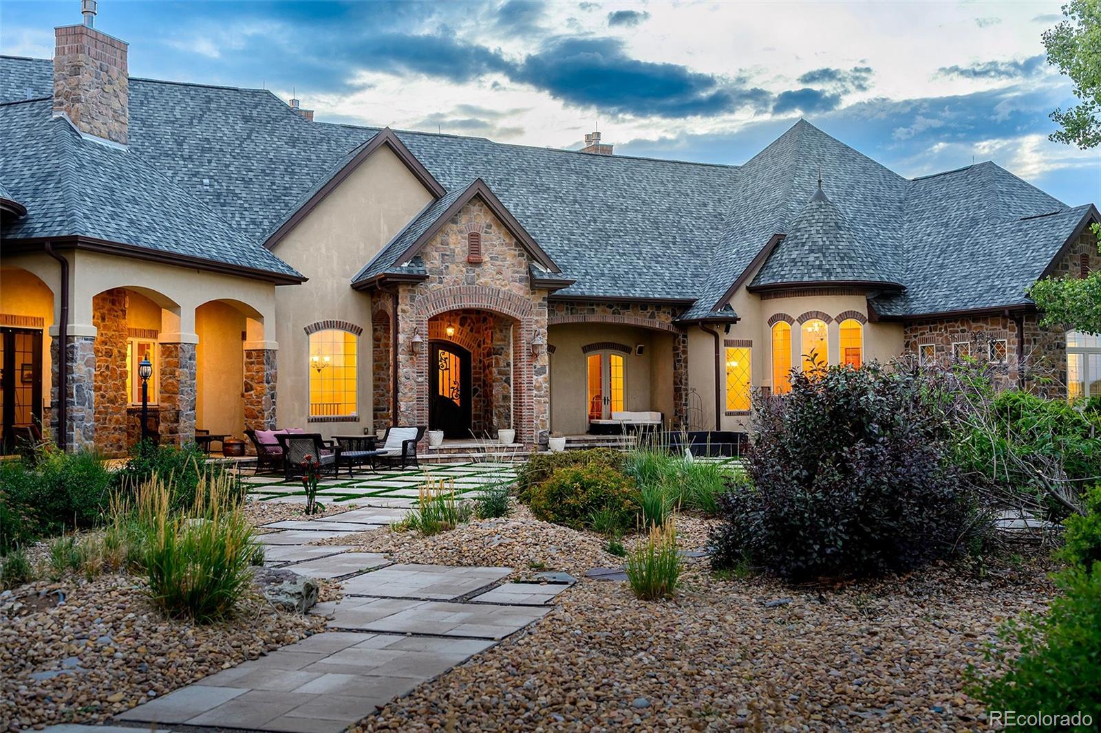 5740 Lambert Ranch Trail Sedalia, CO 80135 - Photo 46 of 48 a front view of house with a garden