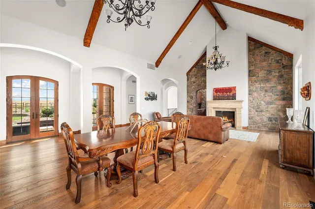 a view of a livingroom with furniture window and wooden floor