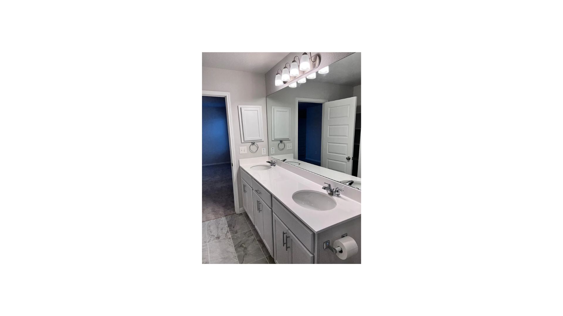320 Rend Drive Leander, TX 78641 - Photo 6 of 11 a bathroom with a sink a mirror and a toilet