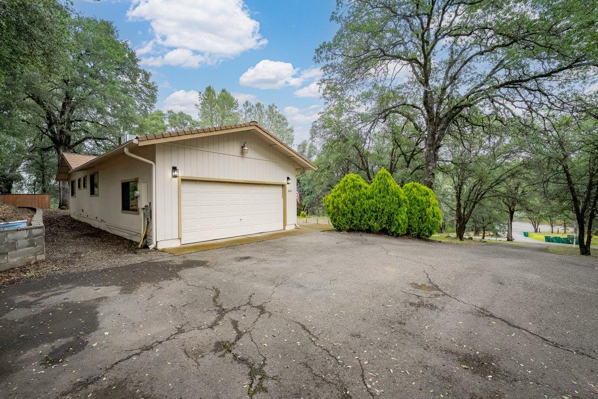 6561 Trinity Way Placerville, CA 95667 - Photo 9 of 58 a view of a house with a outdoor space and backyard