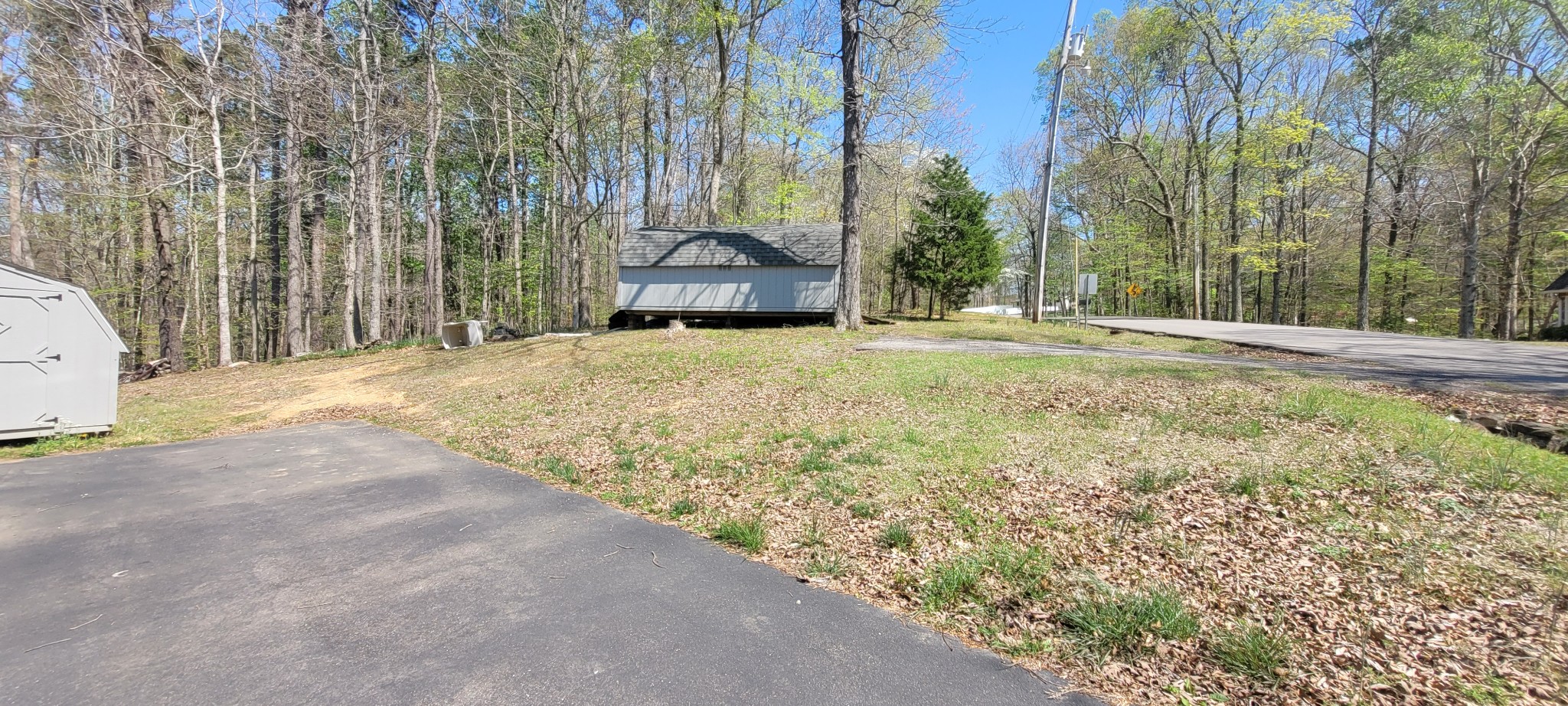 408 Sandy Road Dover, TN 37058 - Photo 27 of 32 a view of a yard with large trees