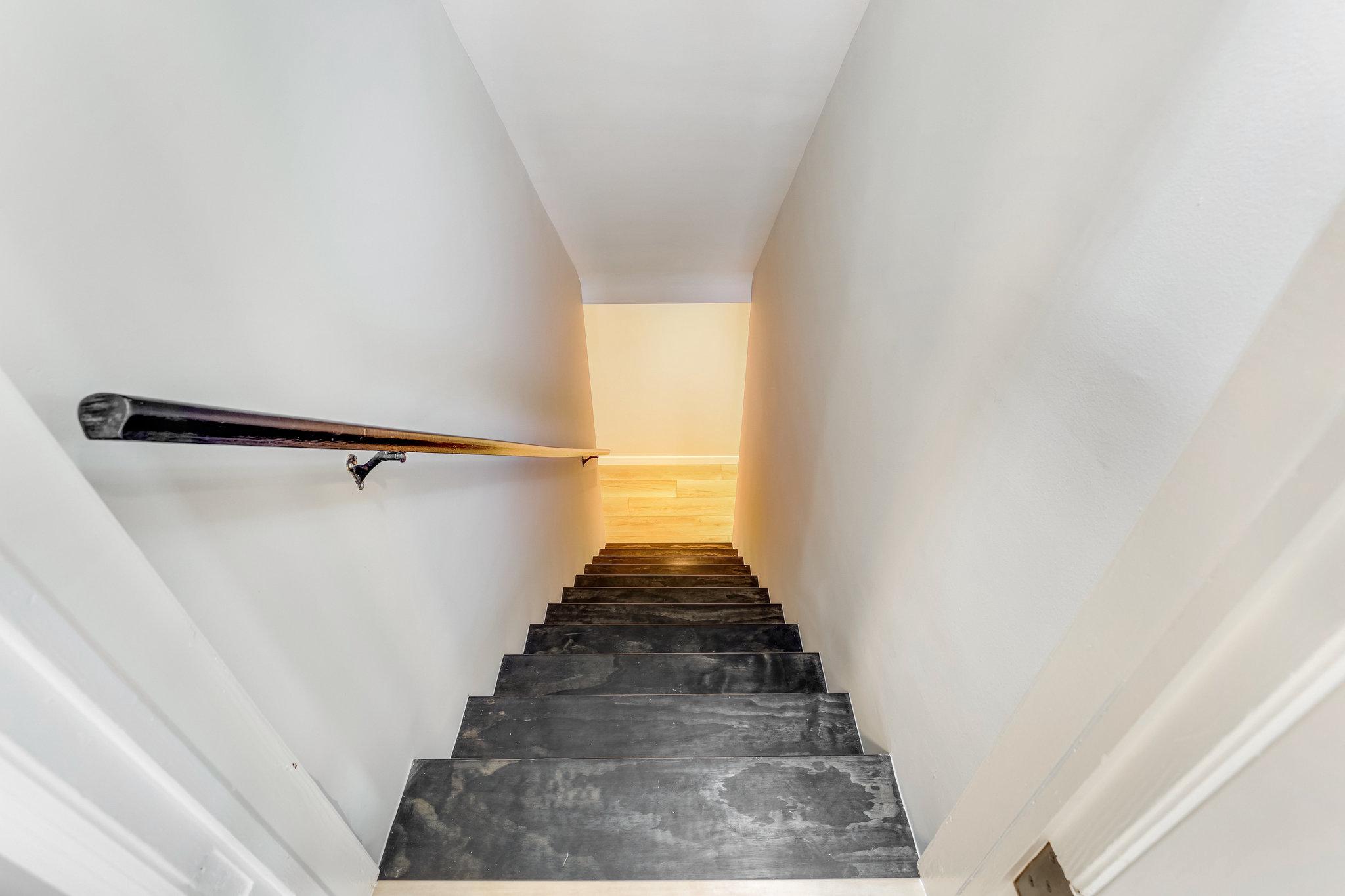 11410 Waples Mill Road Oakton, VA 22124 - Photo 44 of 62 Inviting descent into lower level cozy spaces.