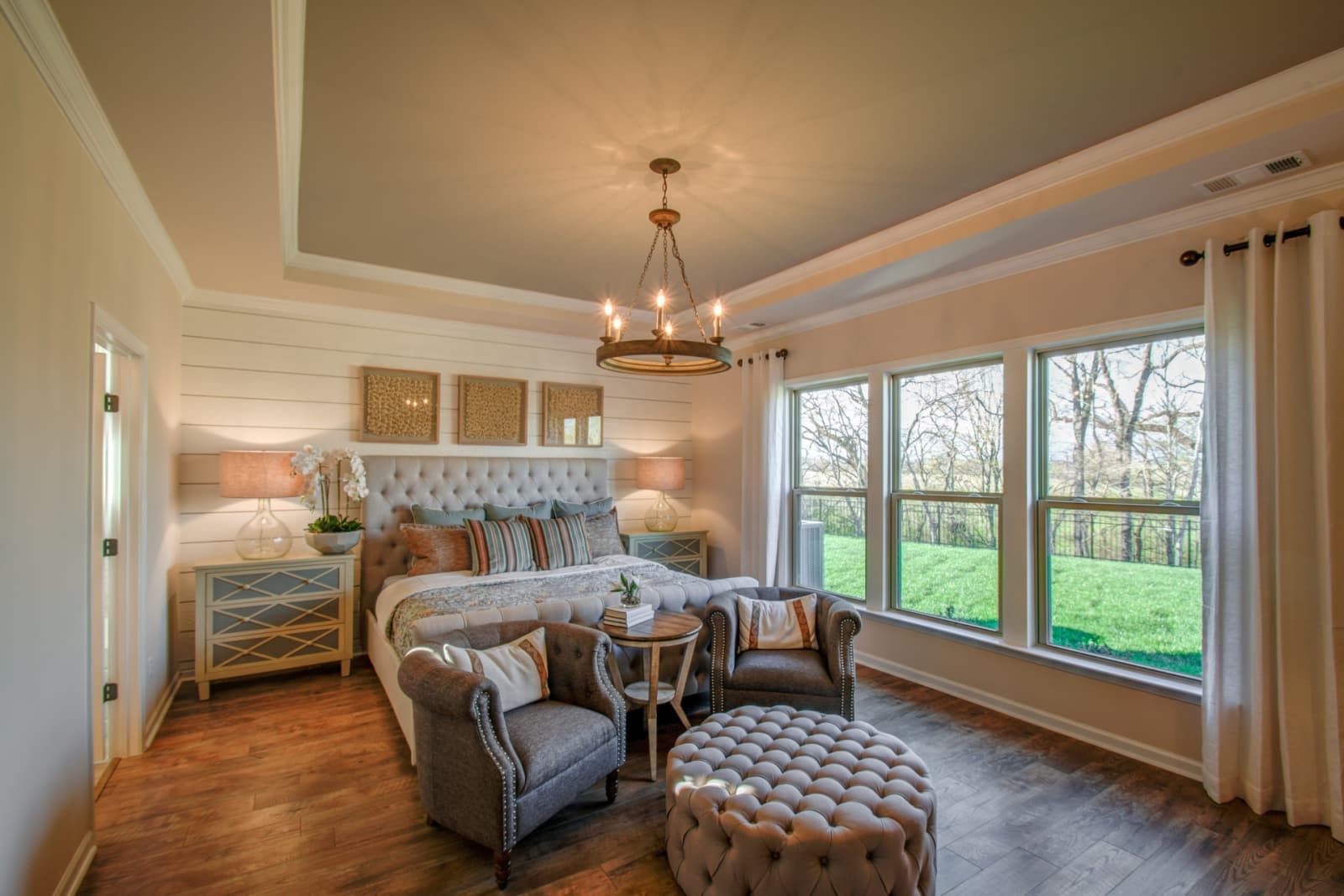 1103 Sumner Grove Spring Hill, TN 37174 - Photo 7 of 18 a bedroom with furniture and a chandelier