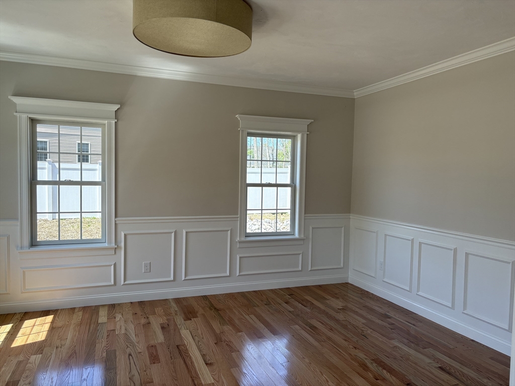 Lot 46 Rebecca Road Whitinsville, MA 01588 - Photo 4 of 13 an empty room with wooden floor and windows