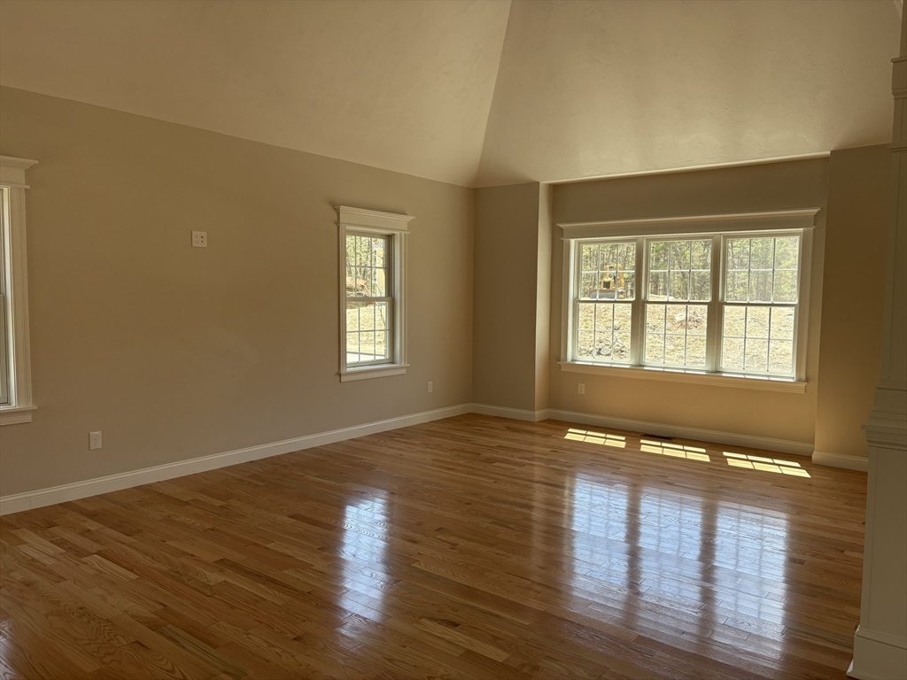 Lot 46 Rebecca Road Whitinsville, MA 01588 - Photo 9 of 13 a view of an empty room with wooden floor and a window