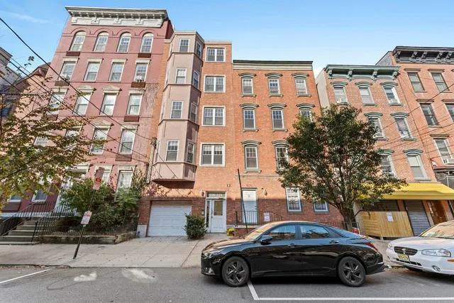 a car parked in front of a building