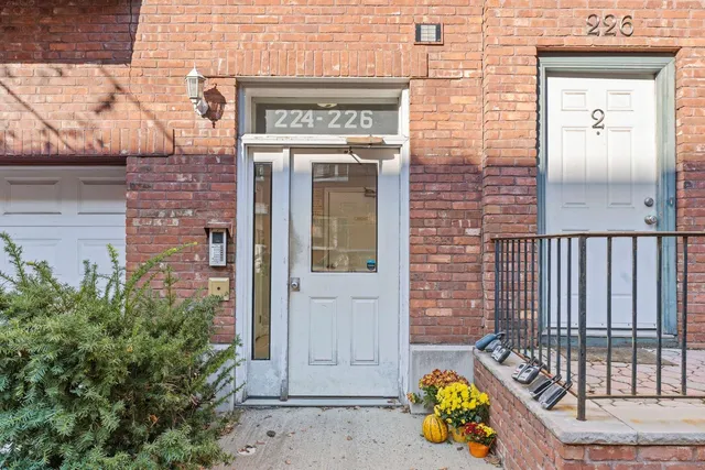 a view of sitting area with front door