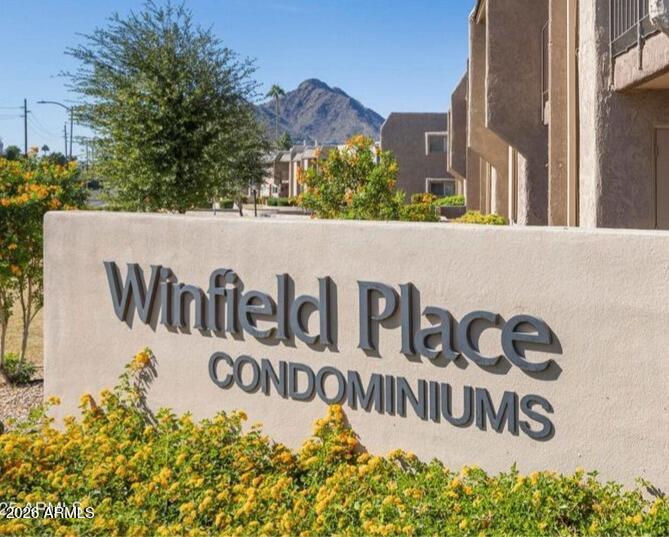 7436 East Chaparral Road, Unit B258 Scottsdale, AZ 85250 - Photo 5 of 23 a street sign that is on a wall
