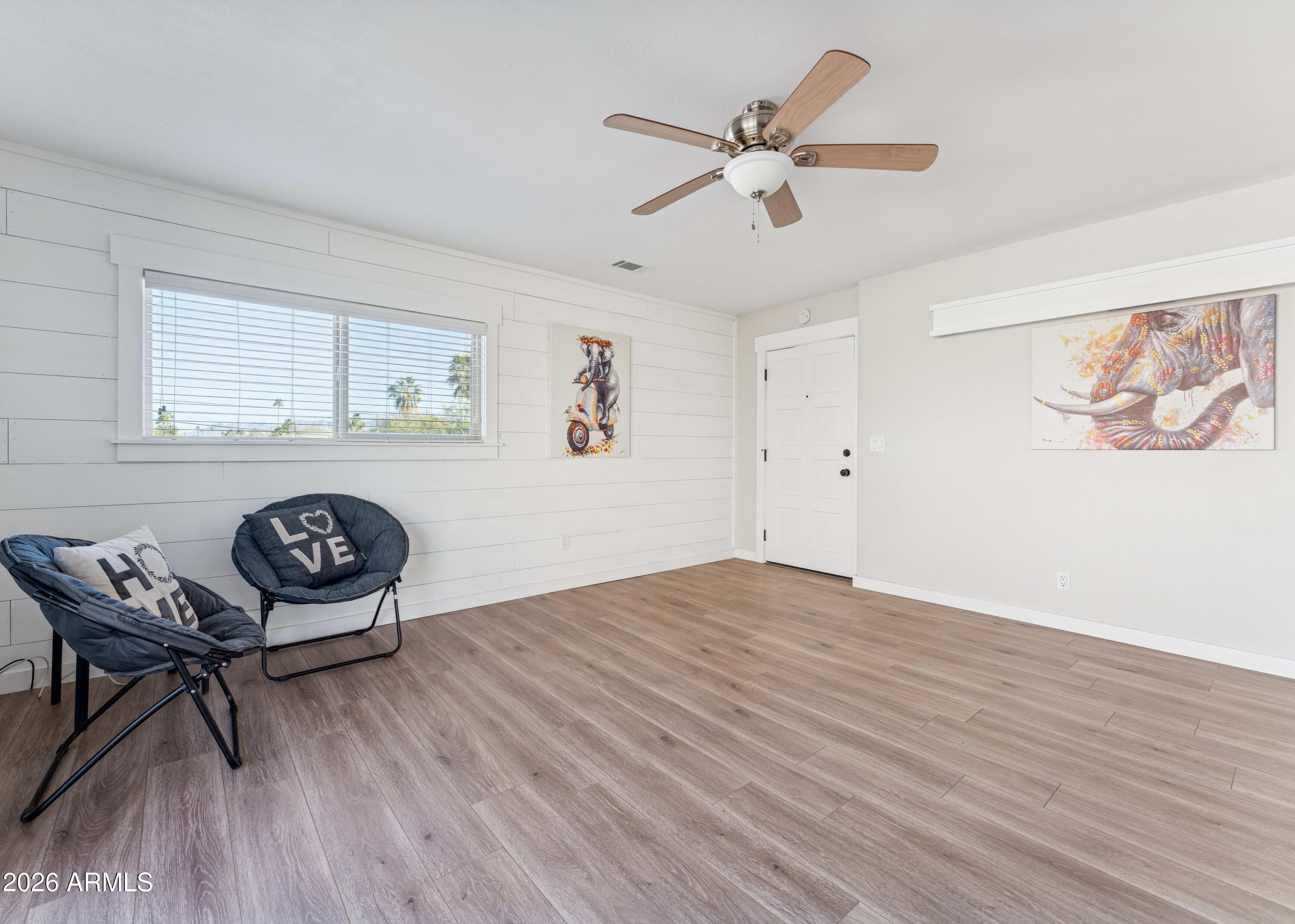 7436 East Chaparral Road, Unit B258 Scottsdale, AZ 85250 - Photo 7 of 23 a view of a livingroom with a table and chairs