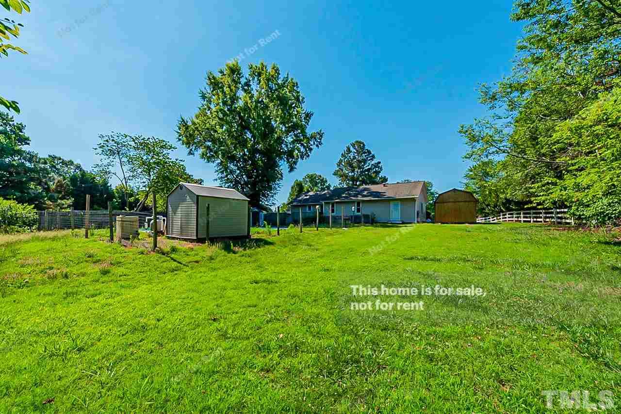 525 Rand Road Raleigh, NC 27603 - Photo 13 of 14 a view of a house with a backyard
