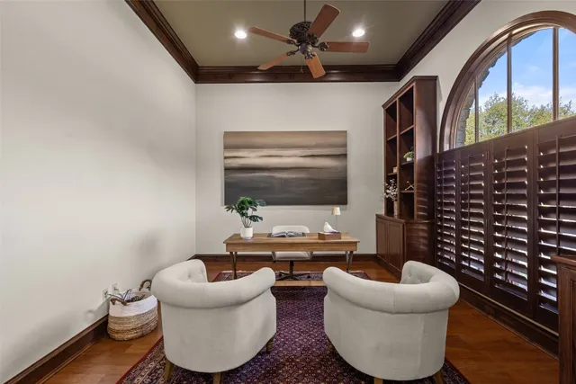 a living room with furniture and a rug