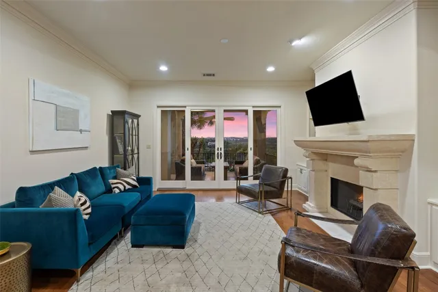 a bedroom with a bed couch and a window