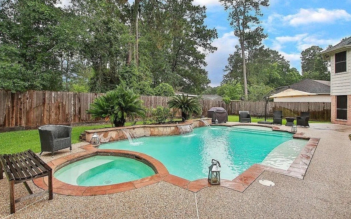 16522 Champions Cove Circle Spring, TX 77379 - Photo 29 of 30 swimming pool view with a seating space