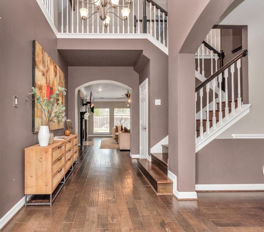 16522 Champions Cove Circle Spring, TX 77379 - Photo 4 of 30 a view of entryway and hall with wooden floor