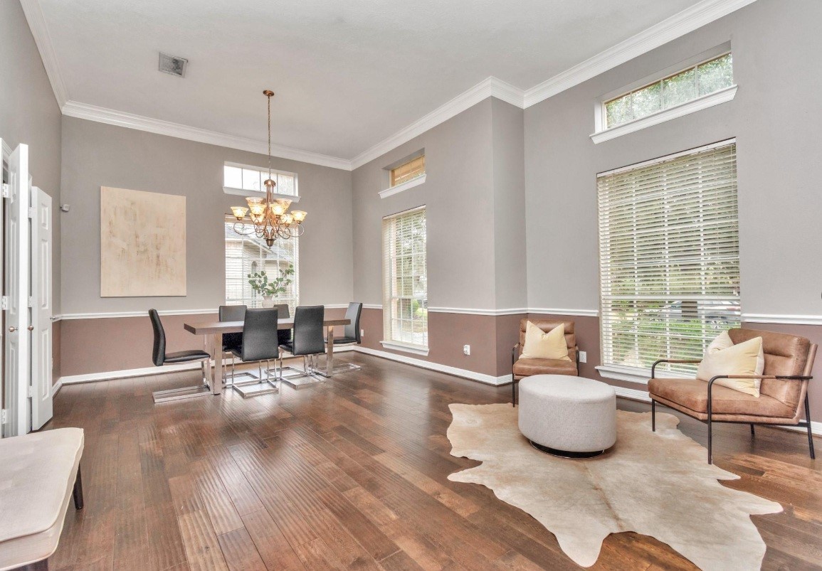 16522 Champions Cove Circle Spring, TX 77379 - Photo 9 of 30 a living room with furniture and a large window
