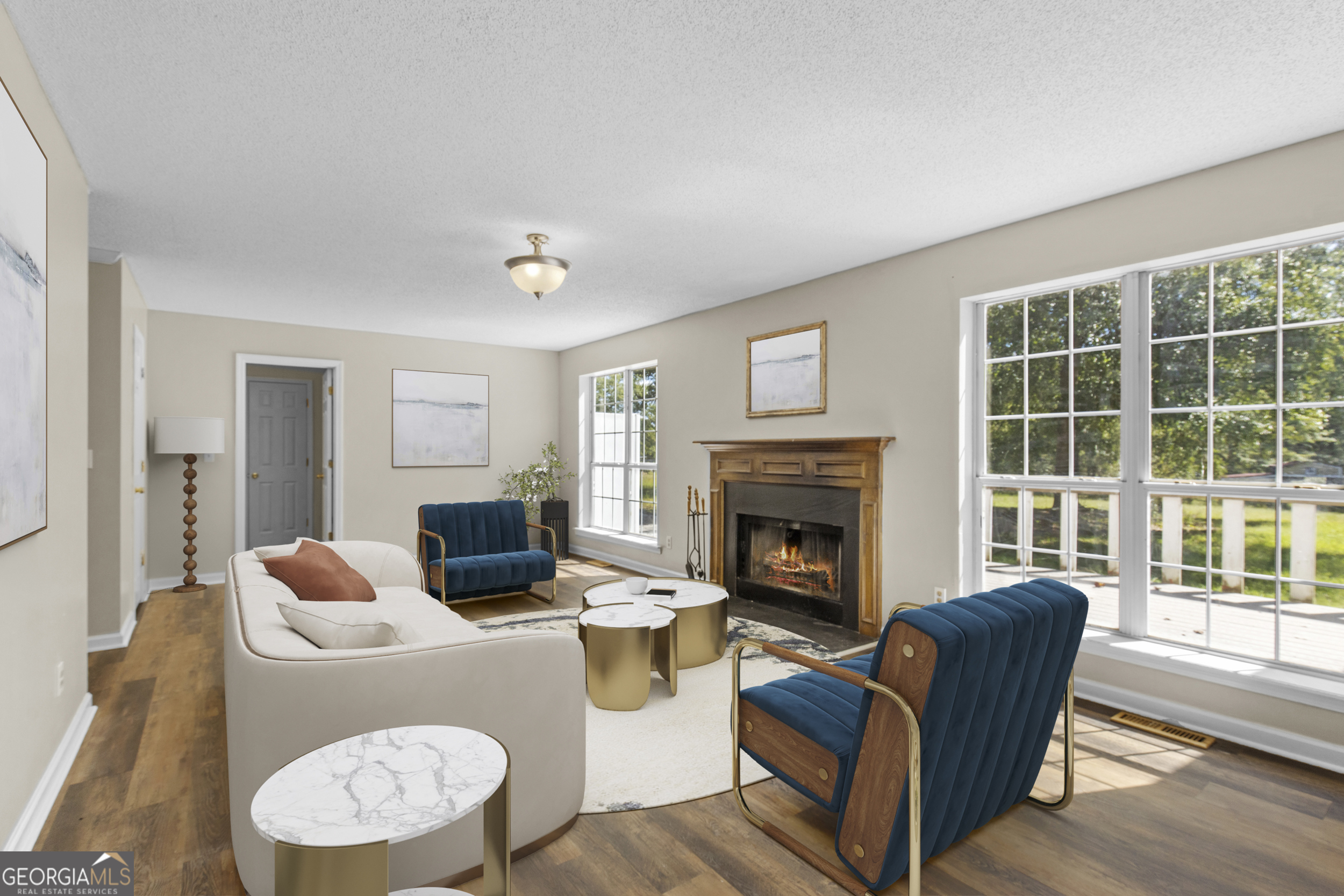 240 Harkness Road Jackson, GA 30233 - Photo 16 of 54 a living room with furniture and a fireplace