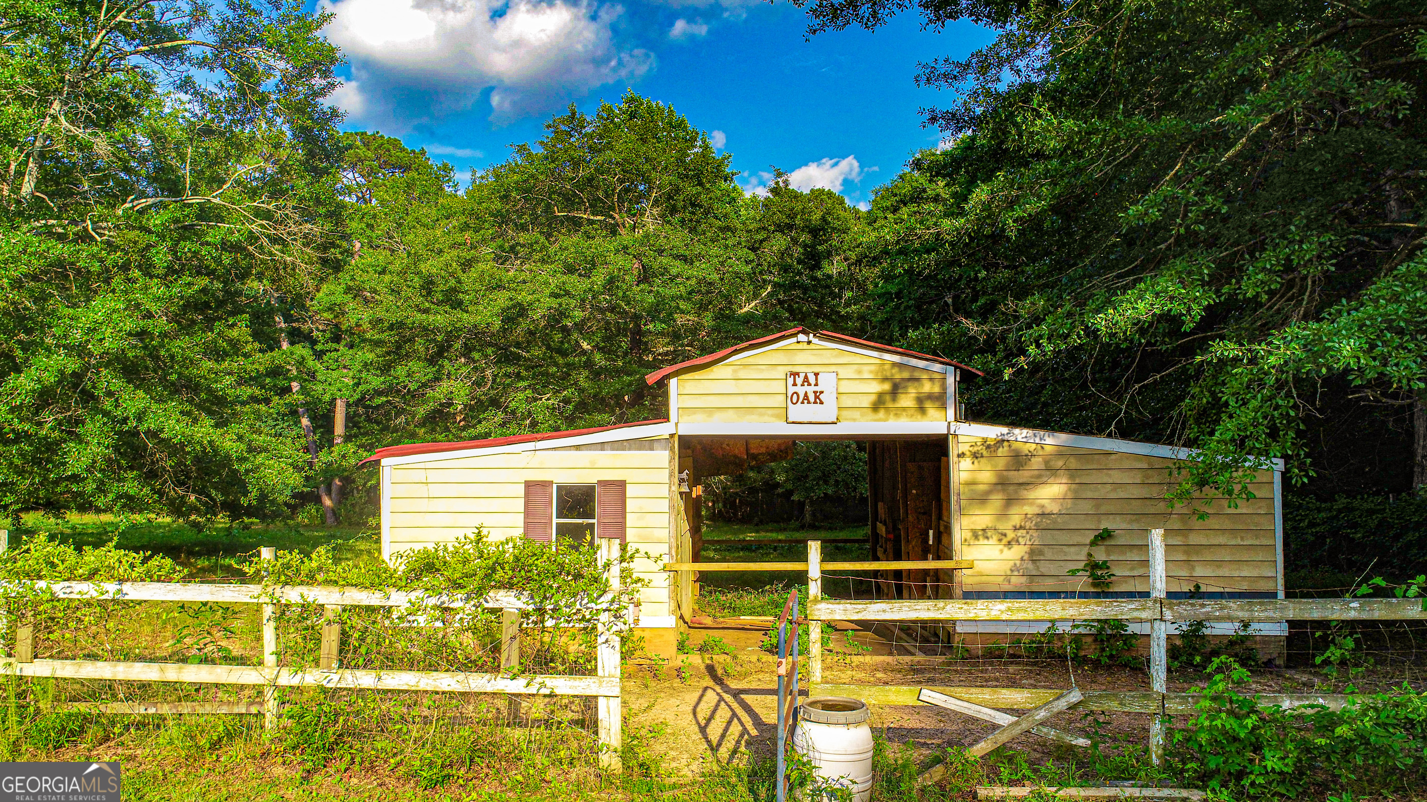 240 Harkness Road Jackson, GA 30233 - Photo 44 of 54 a view of a house with a yard