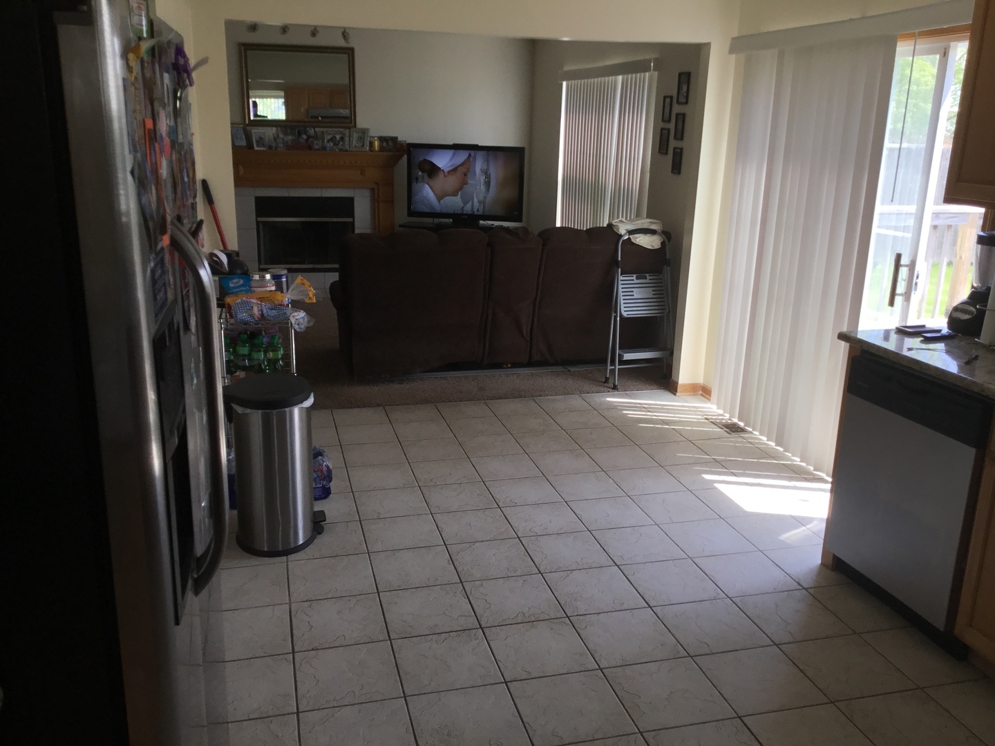 4741 West Lilac Avenue Monee, IL 60449 - Photo 8 of 28 a view of a refrigerator and an empty room