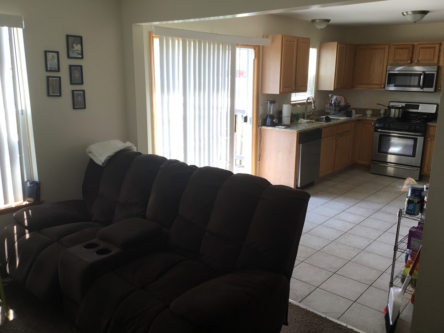 4741 West Lilac Avenue Monee, IL 60449 - Photo 10 of 28 a kitchen with a refrigerator and a stove