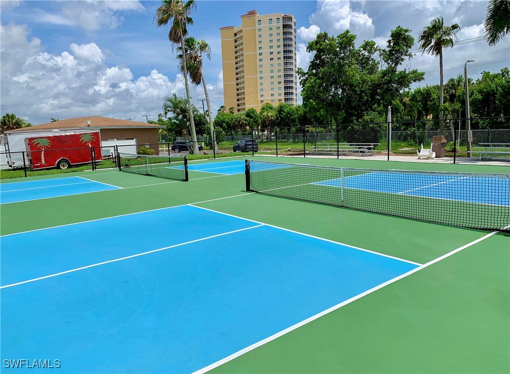 19681 Summerlin Road, Unit 609T Fort Myers, FL 33908 - Photo 17 of 20 a view of a tennis court