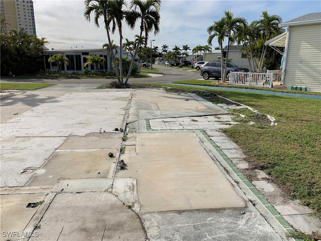 19681 Summerlin Road, Unit 609T Fort Myers, FL 33908 - Photo 9 of 20 a view of a backyard