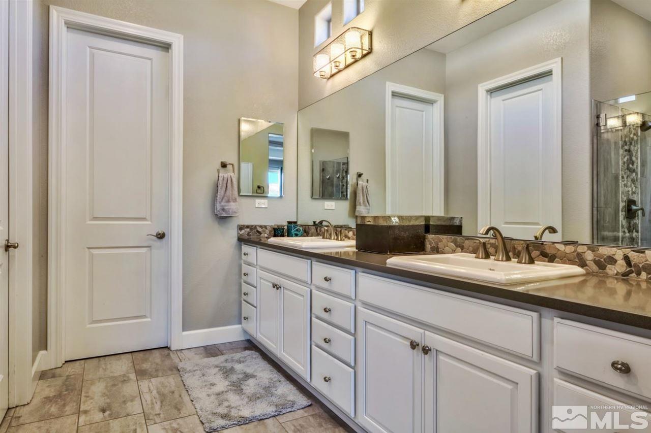 2010 Back Nine Trail Reno, NV 89523 - Photo 14 of 25 a spacious bathroom with a double vanity sink and a mirror