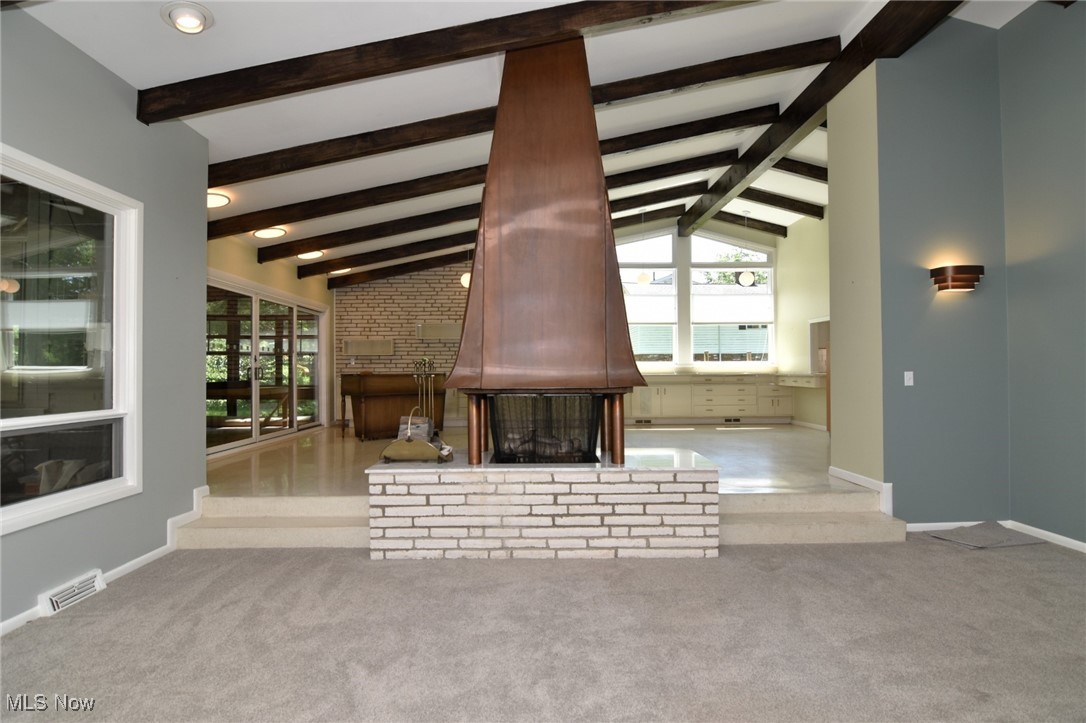 2793 Belgrave Road Cleveland, OH 44124 - Photo 12 of 40 Great room featuring fire place and beam ceilings