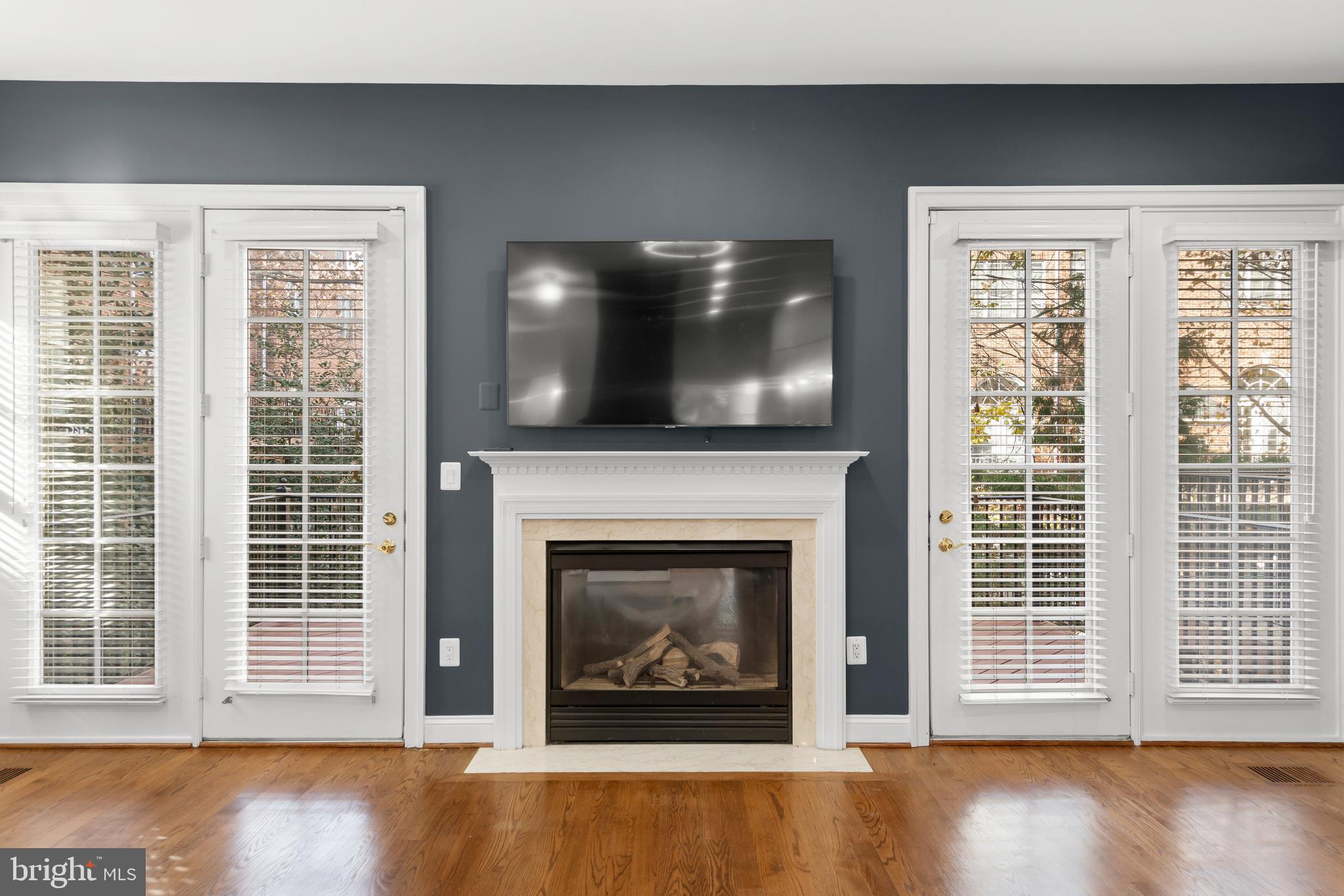 4705 Monaco Circle Bethesda, MD 20814 - Photo 6 of 22 Double French Doors from Deck to Living Room