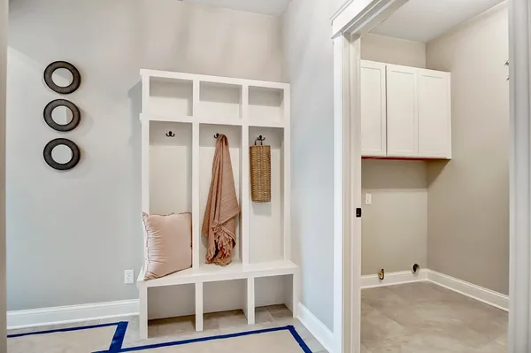 a bathroom with a shower and a sink
