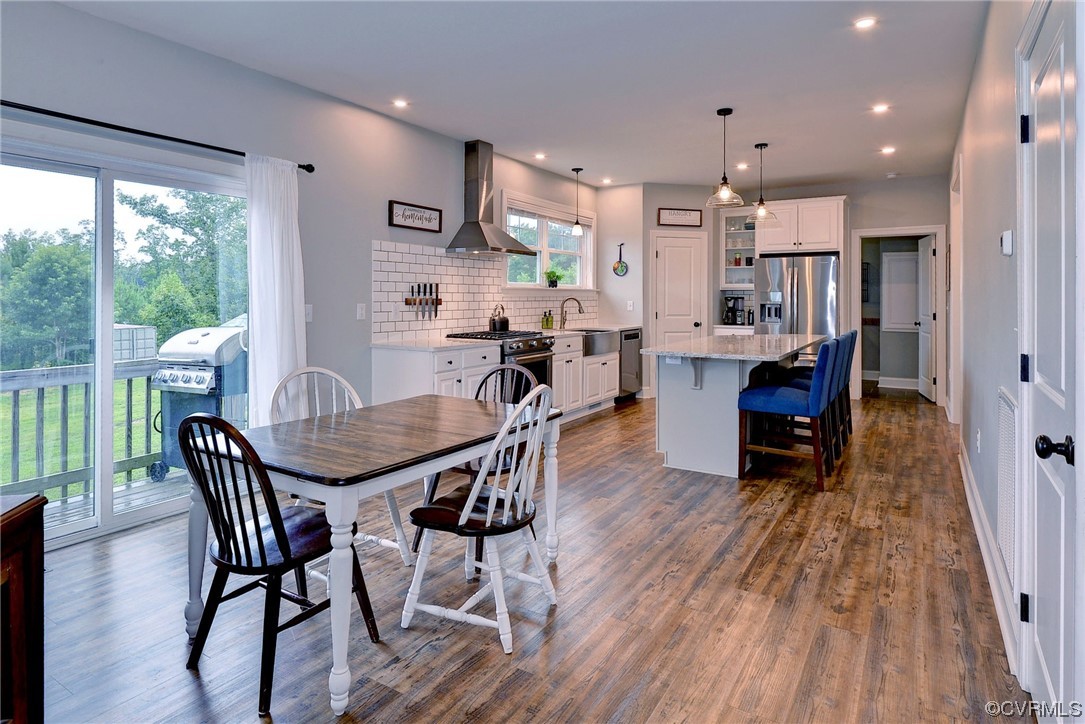 2970 Evergreen Road Providence Forge, VA 23140 - Photo 17 of 48 a view of a dining room with furniture window and wooden floor