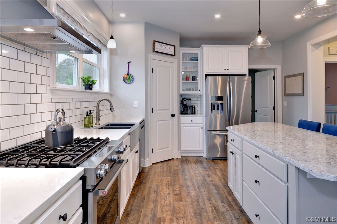 2970 Evergreen Road Providence Forge, VA 23140 - Photo 20 of 48 a kitchen with stainless steel appliances a stove refrigerator sink and cabinets