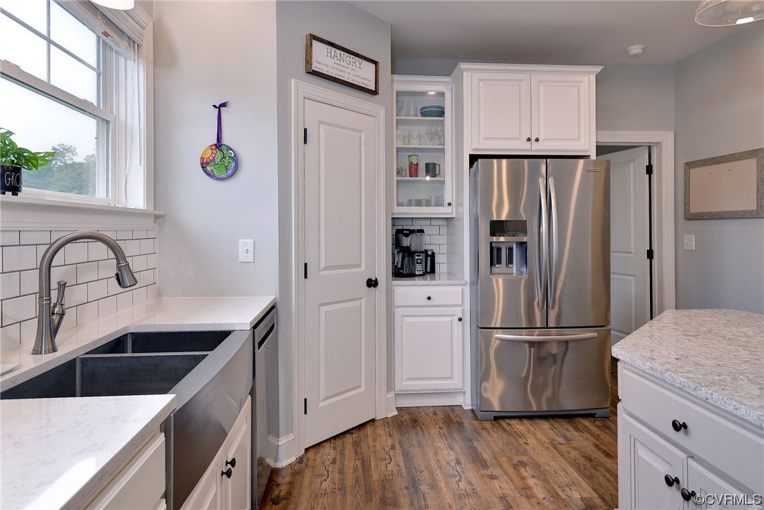 2970 Evergreen Road Providence Forge, VA 23140 - Photo 22 of 48 a kitchen with stainless steel appliances a refrigerator sink and cabinets