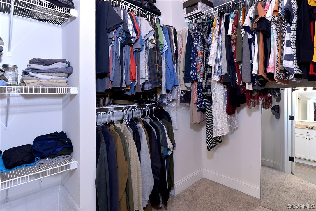 2970 Evergreen Road Providence Forge, VA 23140 - Photo 28 of 48 a view of walk in closet with clothes and shoes