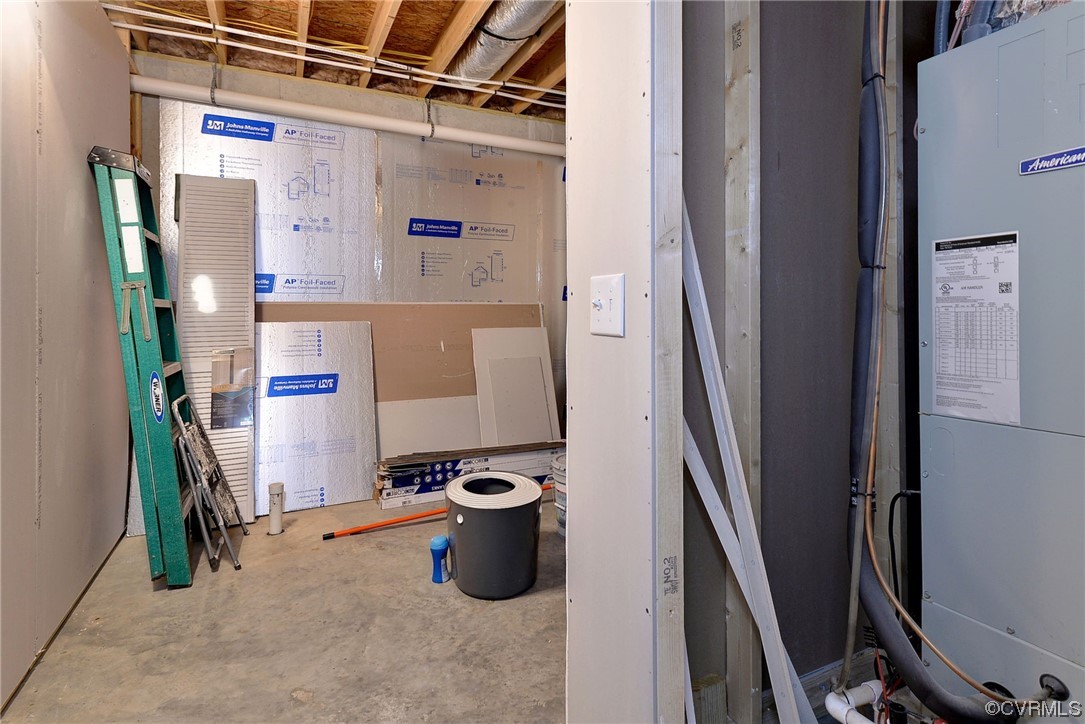 2970 Evergreen Road Providence Forge, VA 23140 - Photo 35 of 48 a view of walk in closet with clothes and shoes