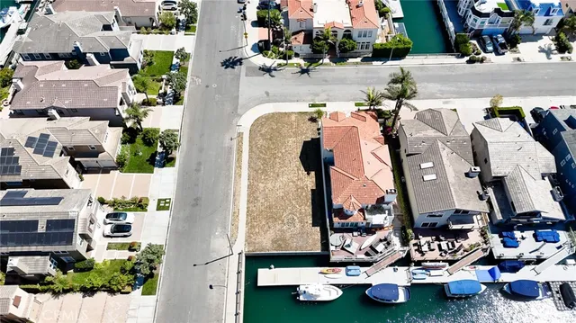 an aerial view of multiple houses with outdoor space