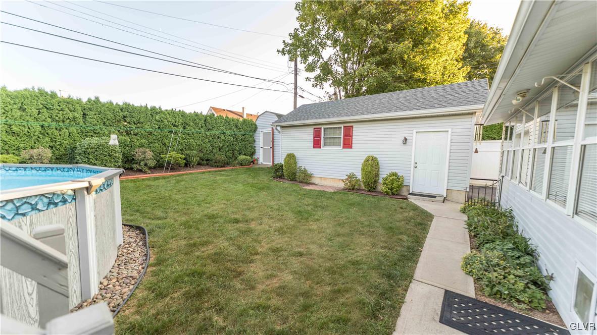 2115 Cypress Road Bethlehem, PA 18018 - Photo 29 of 30 Property line goes to behind the arborvitae. Stora