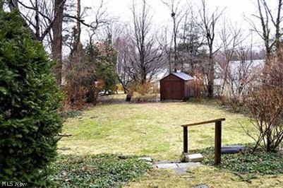 1656 Rushton Road Cleveland, OH 44121 - Photo 18 of 20 Nice shed in the back to keep all your yard equipment and gardening tools