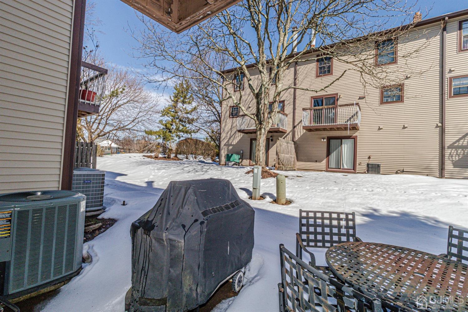6803 Hana Road Edison, NJ 08817 - Photo 22 of 25 a view of a brick building with many windows