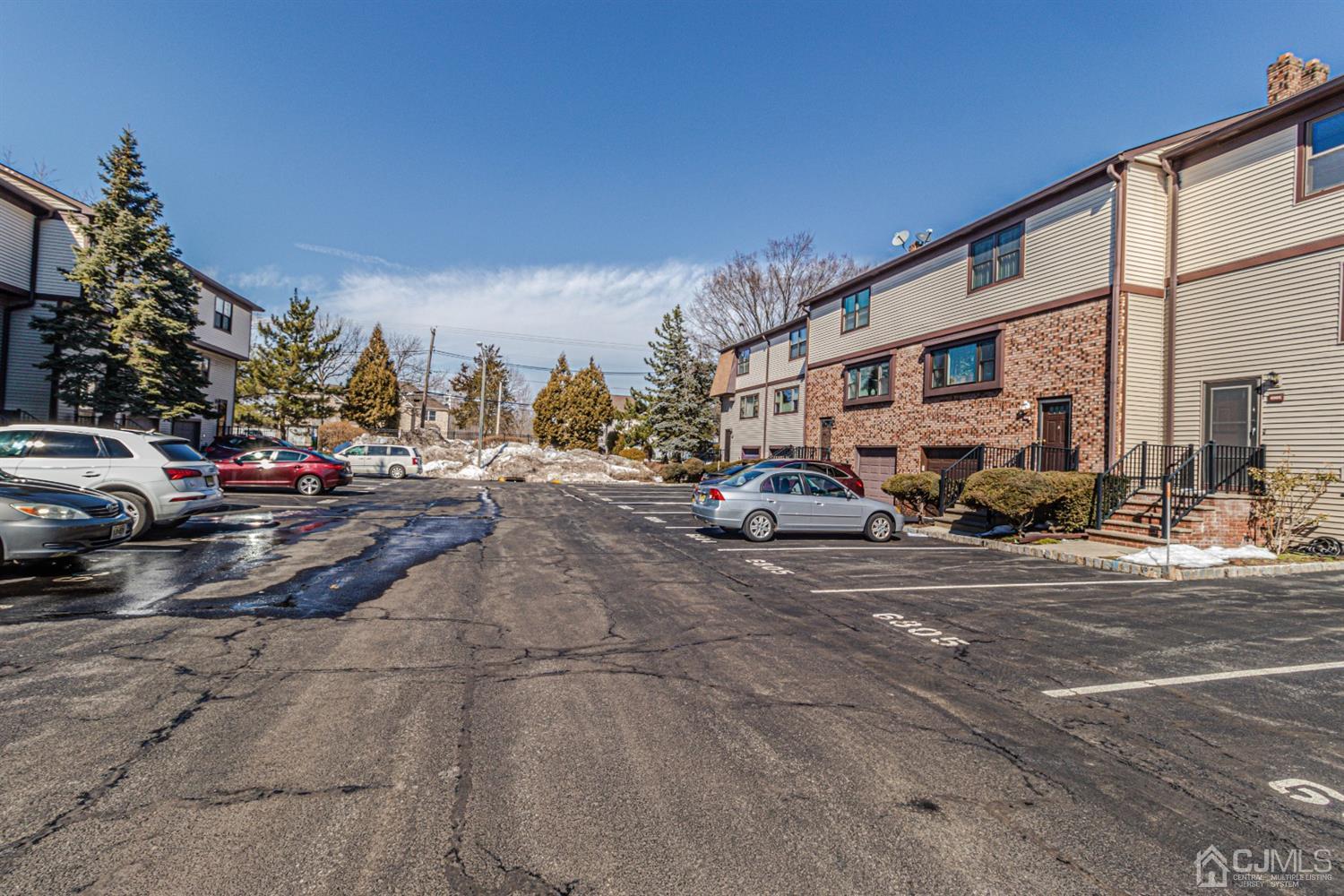 6803 Hana Road Edison, NJ 08817 - Photo 25 of 25 a view of street with parked cars