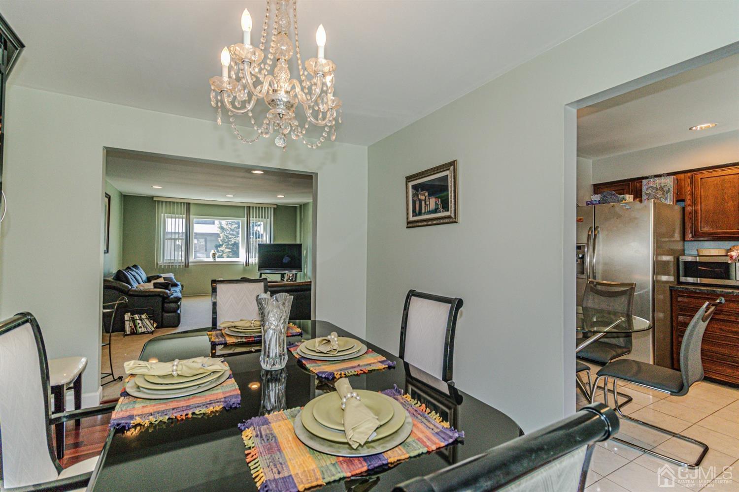 6803 Hana Road Edison, NJ 08817 - Photo 8 of 25 a view of a dining room with furniture
