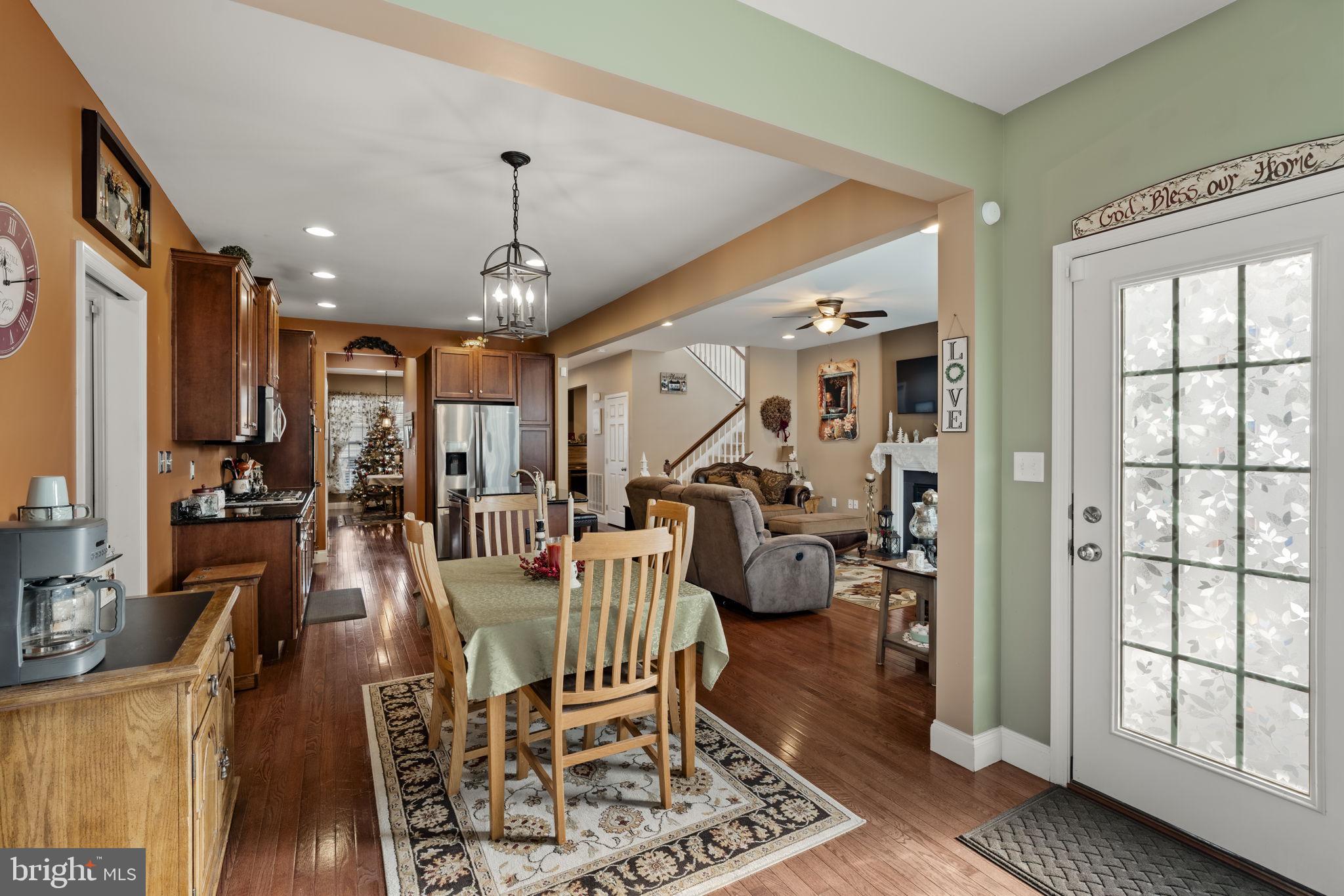 8 White Tail Path Lancaster, PA 17602 - Photo 20 of 51 a living room with furniture a chandelier and a floor to ceiling window