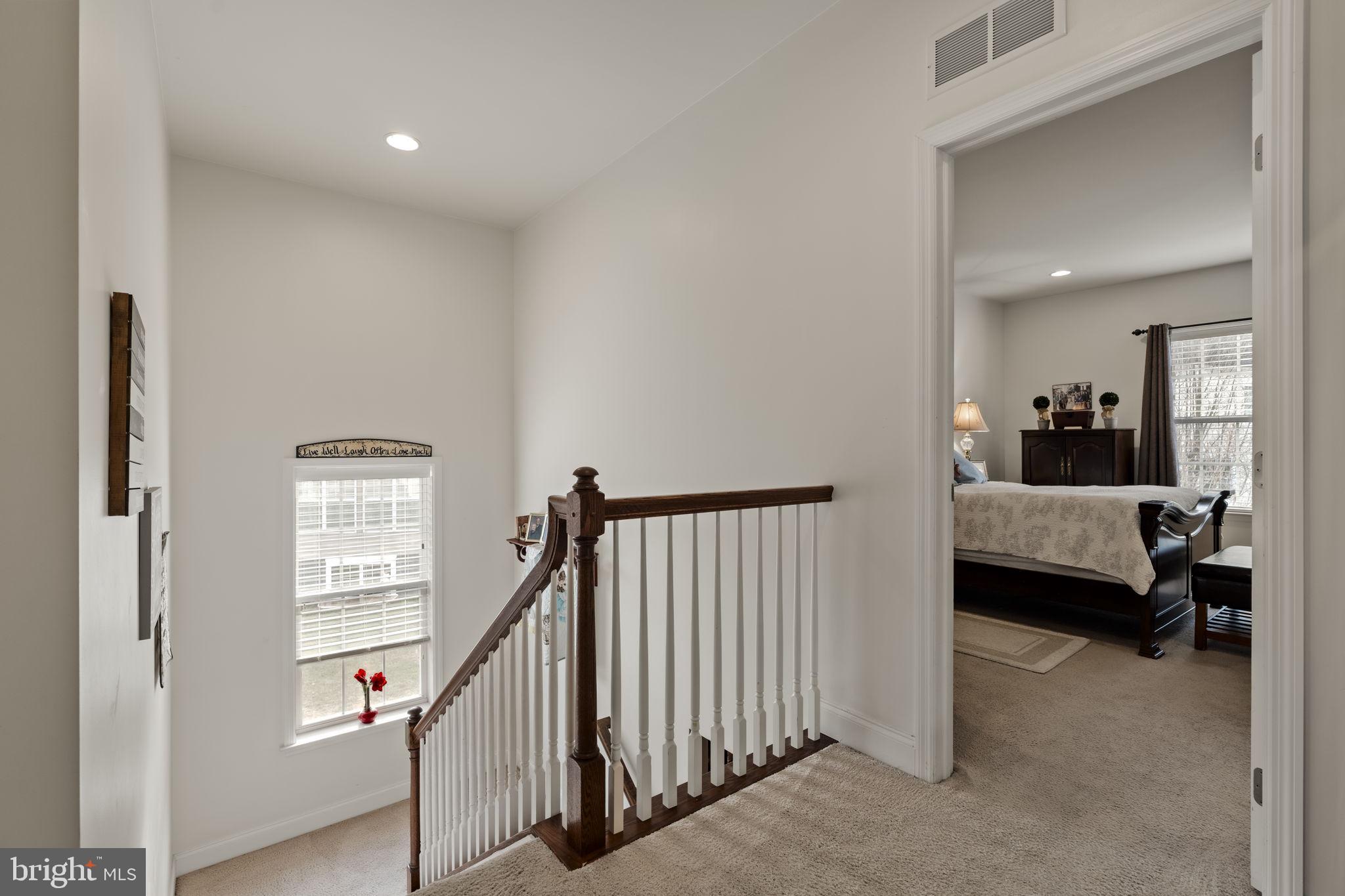 8 White Tail Path Lancaster, PA 17602 - Photo 24 of 51 a view of a bedroom with wooden floor and stairs