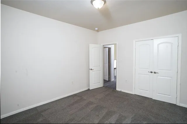 a view of a room with an entryway