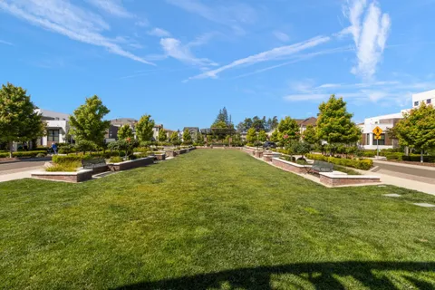 a garden view with a seating space