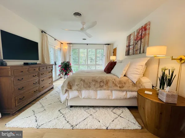 a room with furniture and a window
